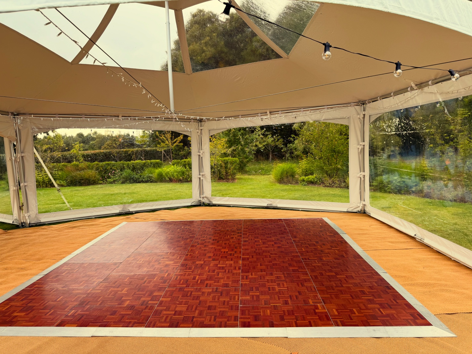 Kent Dance Floors 15ft by 15ft wooden parquet dancefloor in a marquee